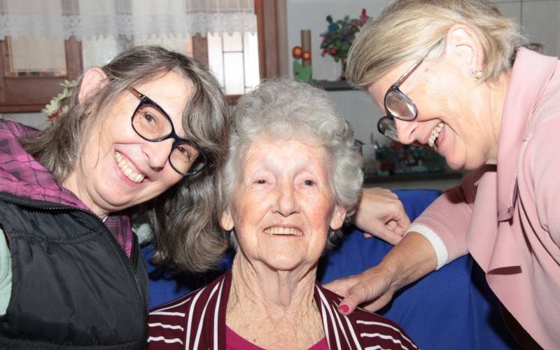 Marcia (right) and Vera share the fun and daily help of Grandma Kandoka
