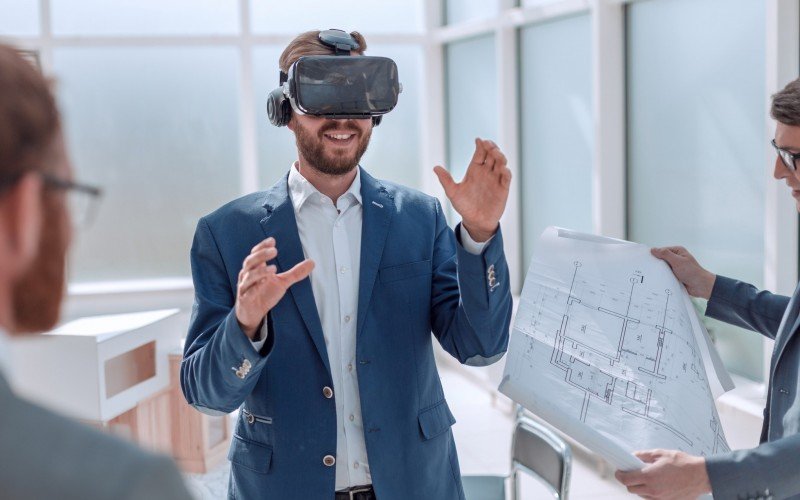 close up. architect using virtual reality glasses in the workplace.