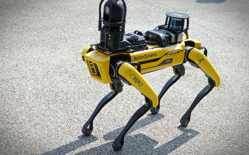 Yellow robot dog, suitable for industrial detection and remote operation. Mini robot guard Spot. Turin, Italy - September 2021