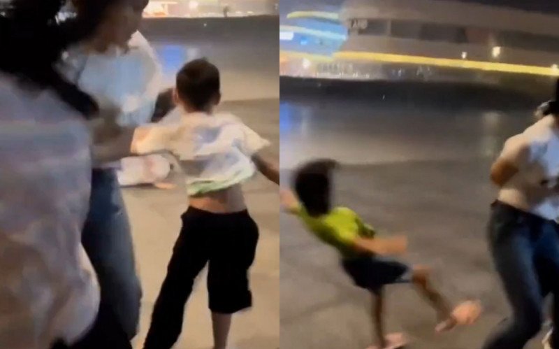 Pais se agarram aos filhos para evitar que sejam levados pelo vento durante passagem de tufão | abc+