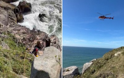VÍDEO: Corpo encontrado durante outra ocorrência é resgatado com uso de rapel e helicóptero em Florianópolis